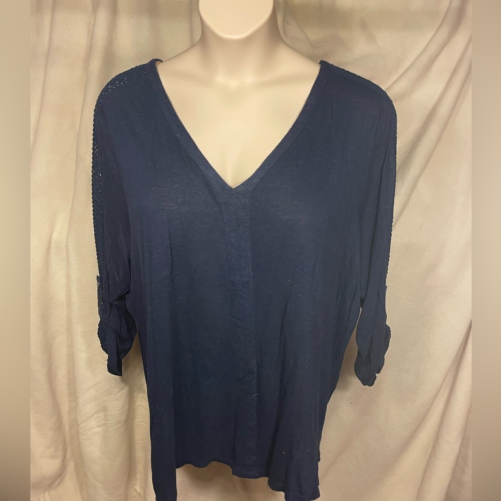 CB Woman size 3X navy v-neck top with crochet accent on yoke and sleeves.